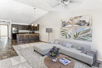 Harrisburg townhouse for rent - a living room with a couch and a table