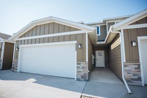 Sioux Falls townhouse for rent - the front of a house with a white garage door