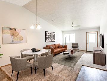 Brandon townhouse for rent - a living room with a table and chairs and a couch