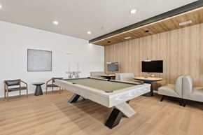 Rapid City apartment for rent - A room with a pool table and a TV.