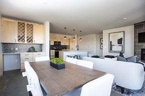 Sioux Falls apartment for rent - a kitchen and dining room with white chairs and a table