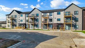 Sioux Falls apartment for rent - Apartment building number 57300 is shown with a parking lot in front.