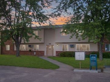 Lennox apartment for rent - the front of a house with a sidewalk in front of it