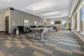 Sioux Falls townhouse for rent - A conference room with a long table and chairs.
