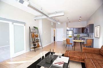 Sioux Falls apartment for rent - a living room with a couch and a table and a kitchen
