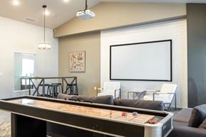 Sergeant Bluff townhouse for rent - a game room with a pool table and a projection screen