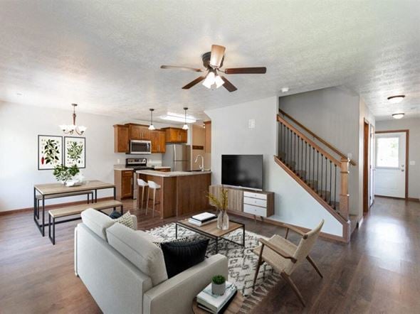 Brandon townhouse for rent - a living room with a couch and a ceiling fan