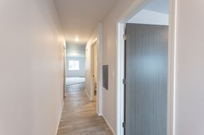 Sioux Falls apartment for rent - a hallway with a door to a bedroom and a bathroom