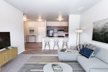 Sioux Falls apartment for rent - a living room and kitchen with a couch and a table