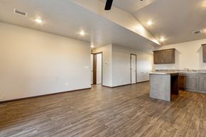 Harrisburg townhouse for rent - A kitchen with a white countertop and wooden flooring.
