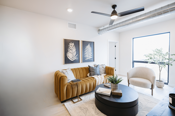 Sioux Falls apartment for rent - a living room with a brown couch and a coffee table