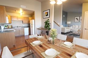 Sioux Falls apartment for rent - a dining room and living room with a table and chairs