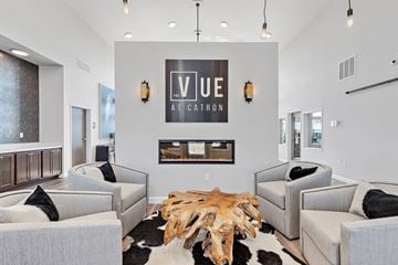 Rapid City apartment for rent - a living room with couches and a coffee table in front of a fireplace