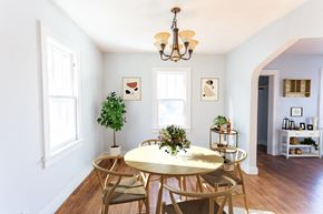 Sioux Falls apartment for rent - a dining room with a table and chairs and a chandelier