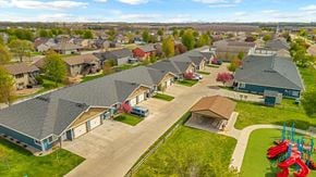 Brandon townhouse for rent - A residential area with houses and a playground.