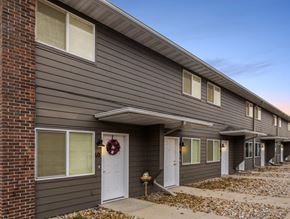 Sioux Falls apartment for rent - the front of a brown house with white doors