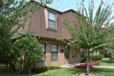 Little Rock apartment for rent - a large brick house with trees in front of it