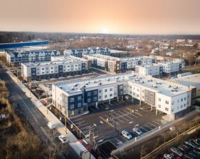Somerset apartment for rent - arial view of a city with buildings and parking lot