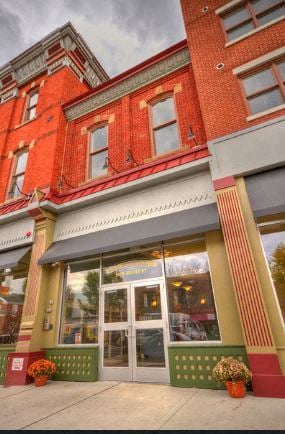 Keansburg apartment for rent - a store front of a red brick building
