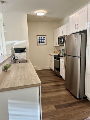 Hillsborough Township apartment for rent - a kitchen with stainless steel appliances and a wooden counter top