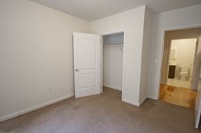 Newark apartment for rent - a bedroom with a closet and a door to a bathroom