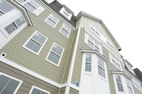 Aberdeen apartment for rent - a green and white apartment building with windows
