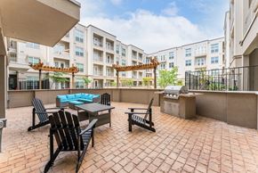 Grand Prairie apartment for rent - Spacious Patio With Sitting Arrangements with BBQ at Residences at 3000 Bardin Road, Grand Prairie, TX, Texas