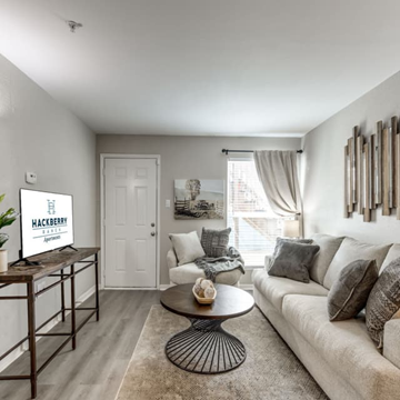 Clute apartment for rent - A living room with a white couch and a coffee table.
