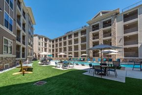 Houston apartment for rent - Poolside Dining Tables at Heights West 11th, Houston