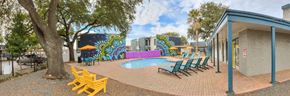 Austin apartment for rent - Swimming pool courtyard with covered pavilion and lounge seating at Azure Apartments, Austin, TX