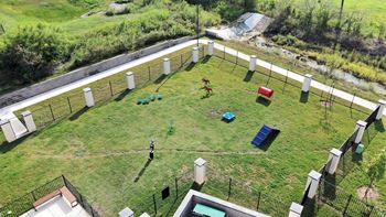 An aerial view of a childrens play area in a yard