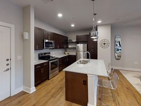 San Marcos apartment for rent - a kitchen with a marble counter top at The Fitzroy San Marcos, San Marcos