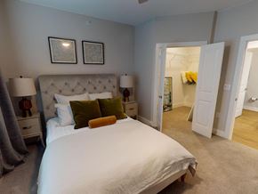 San Marcos apartment for rent - a bedroom with a large bed and a closet at The Fitzroy San Marcos, San Marcos, Texas