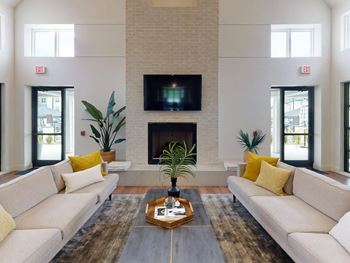 A living room with couches and a coffee table