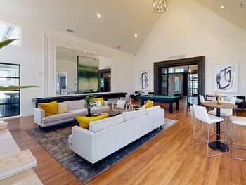 The living room is open to the dining room and kitchen