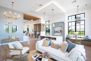 Open concept living room with high ceilings