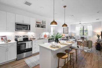 Modern kitchen island with open floor plan