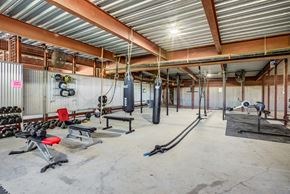 San Antonio apartment for rent - Fitness center with boxing equipment and free weights at 1221 Broadway Lofts Apartments, San Antonio, TX