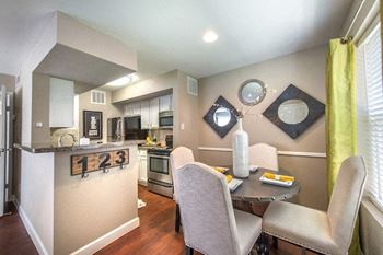 Open kitchen and dining area with modern finishes