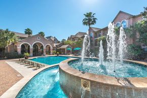 Houston apartment for rent - Resort style pool with fountains and lounge chairs at Melia Medical Center Apartments, Houston