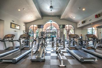 Fitness with treadmills and arched windows