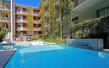 Resort style pool with waterfall feature
