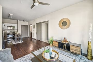San Antonio apartment for rent - A living room with a grey sofa and a coffee table.