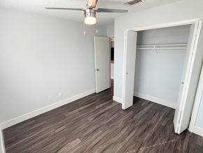 Austin apartment for rent - an empty bedroom with a closet and a ceiling fan at Northchase, Austin