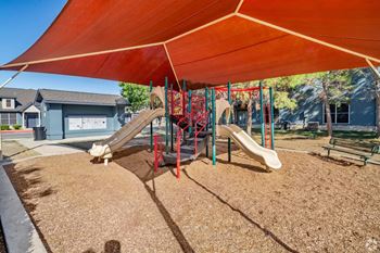 Playground with shade structure and climbing equipment