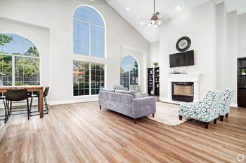 Bright living room with tall arched windows