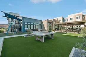 Roseville apartment for rent - Outdoor recreation area with playground and ping pong at The Crawford Apartments, California