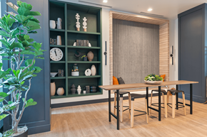 Sacramento apartment for rent - A dining room with a wooden table and chairs.