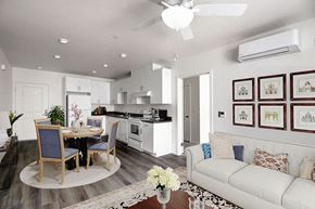 Panorama City apartment for rent - a virtually living room and kitchen with a couch and a table