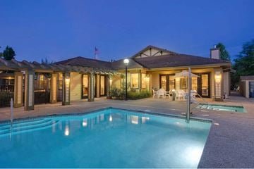 Folsom apartment for rent - A house with a pool in front of it.